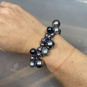 Silver Multi Toned Beaded dangle Bracelet. Stretchy Band